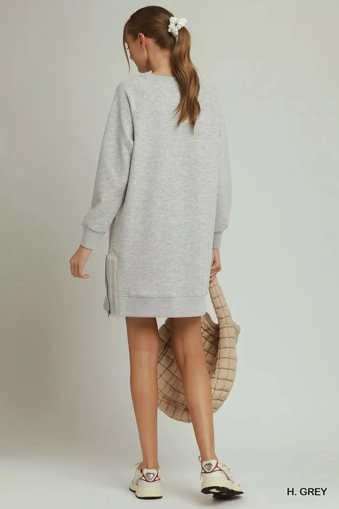 Umgee crochet zipper detailed dress featuring side crochet accents and a stylish design, perfect for casual or dressy occasions.