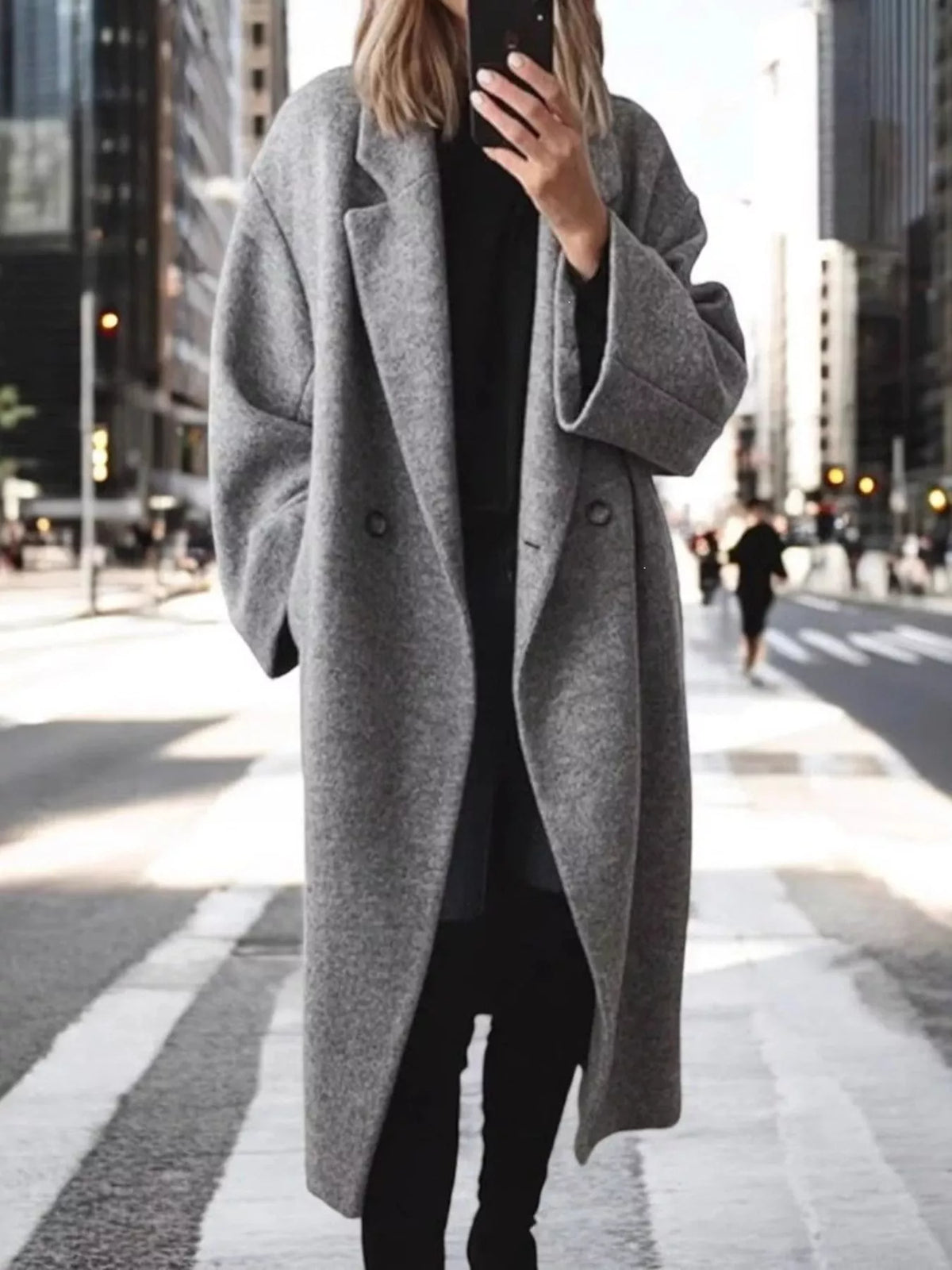 Plus size longline wool blend coat with lapel collar, casualwear by Trendsi, shown in full length with tailored fit and neutral color.