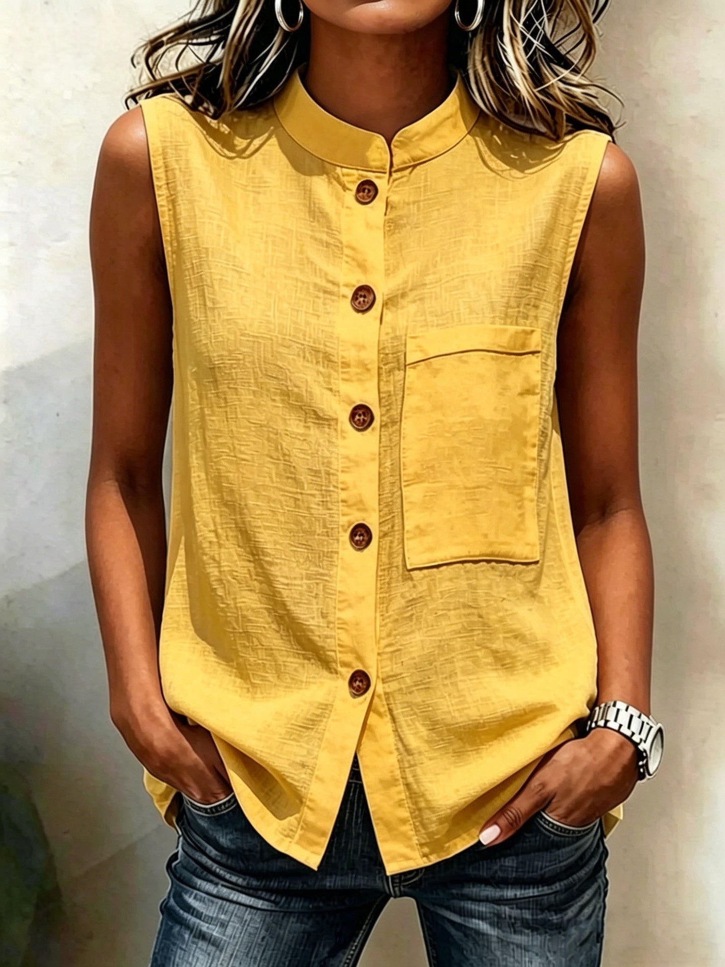 Women's sleeveless crop top with buttoned pockets, solid color casualwear by FitiqueFit, shown in water background image.