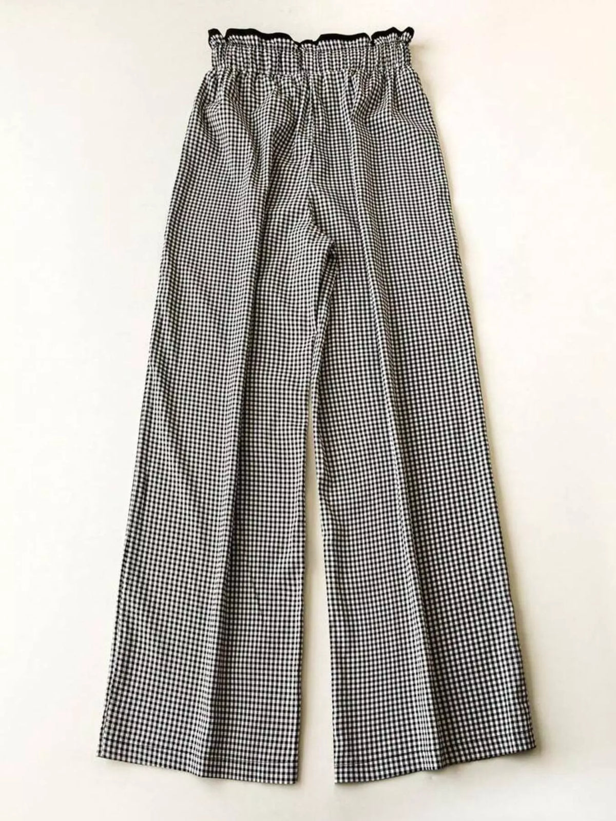 Women’s high-waisted gingham wide-leg pants with pockets from Plush Fashion Hub, featuring a stylish checkered pattern and relaxed fit.