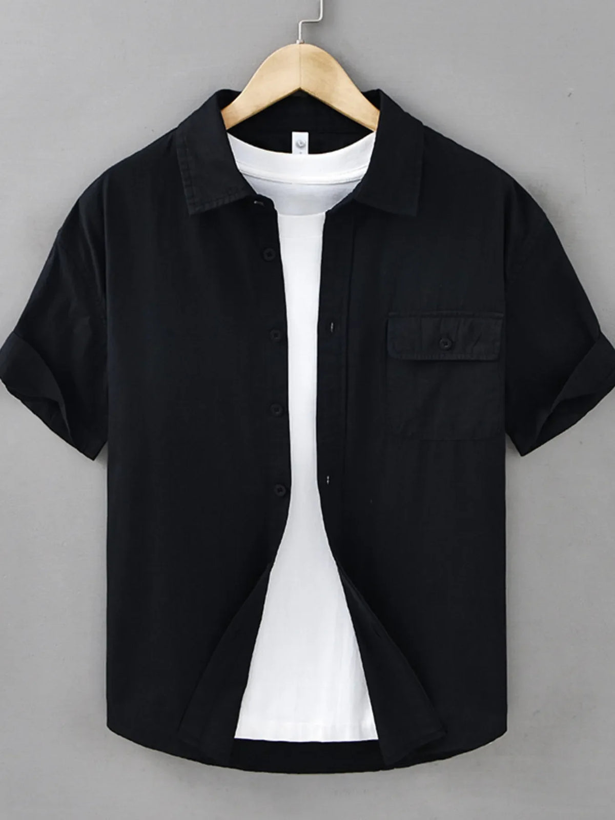 Plus size men's short sleeve button-up shirt by Plush Fashion Hub, featuring a casual, stylish design in breathable fabric.