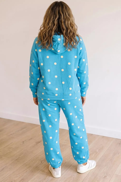 Plus size polka dot hooded drawstring long sleeve top and pants set by Trendsi, featuring a comfortable, stylish polka dot design.