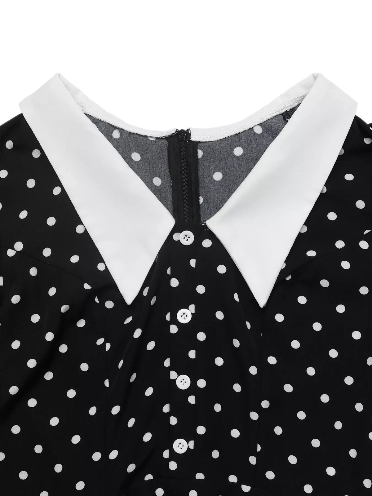 Polka dot Peter Pan collar dress by Plush Fashion Hub featuring a classic design, white collar, and black fabric with white polka dots.