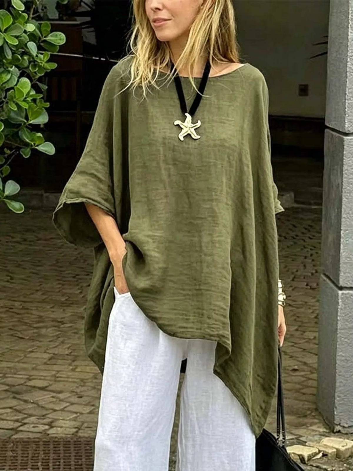 Plus size loose fit asymmetrical hem tunic top by Plush Fashion Hub, showcasing a comfortable, flowing design with relaxed fit.