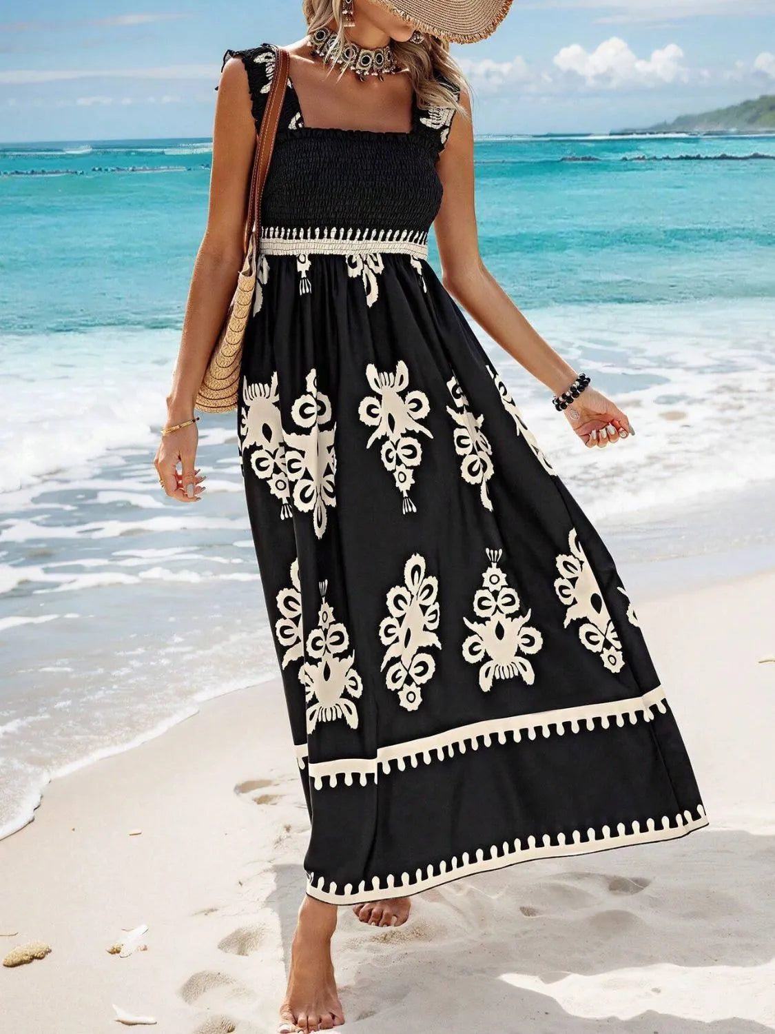 Plush Fashion Hub smocked printed wide strap maxi dress with flowing fabric and floral pattern, perfect for summer wear.