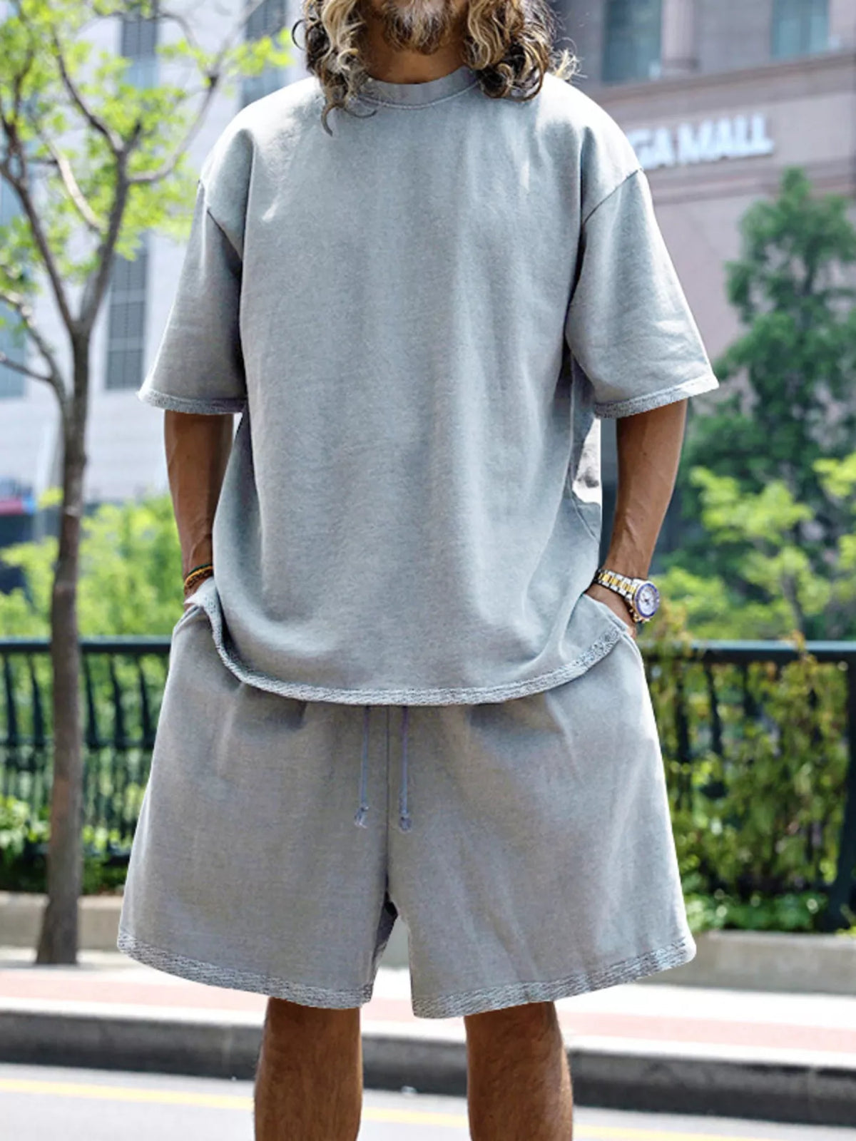 Plus size men's relaxed fit T-shirt and shorts set by Plush Fashion Hub, featuring casual tops and shorts for comfortable wear.