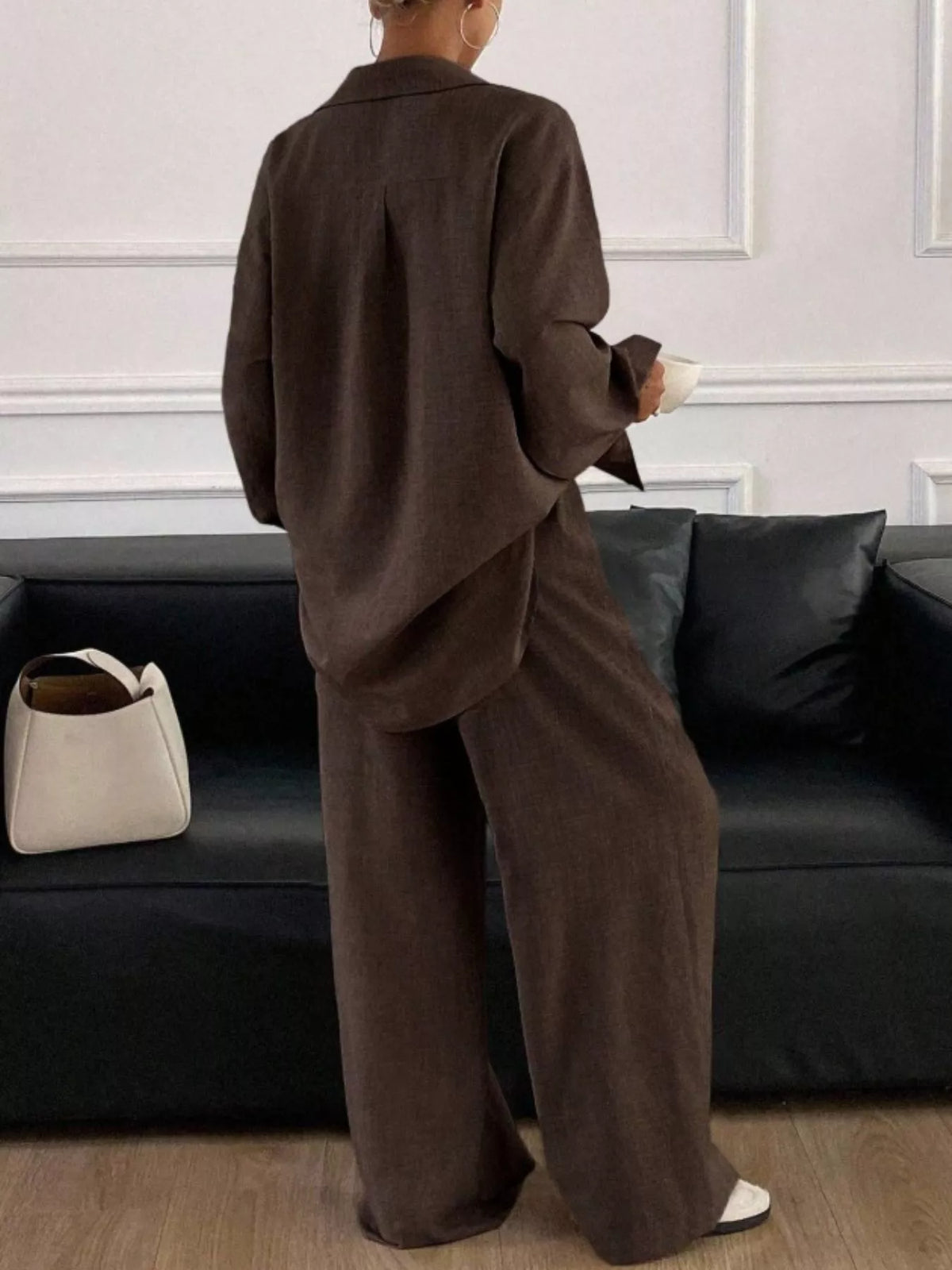 Trendsi long sleeve button-up shirt and wide-leg pants set, stylish casual clothing ensemble for women.