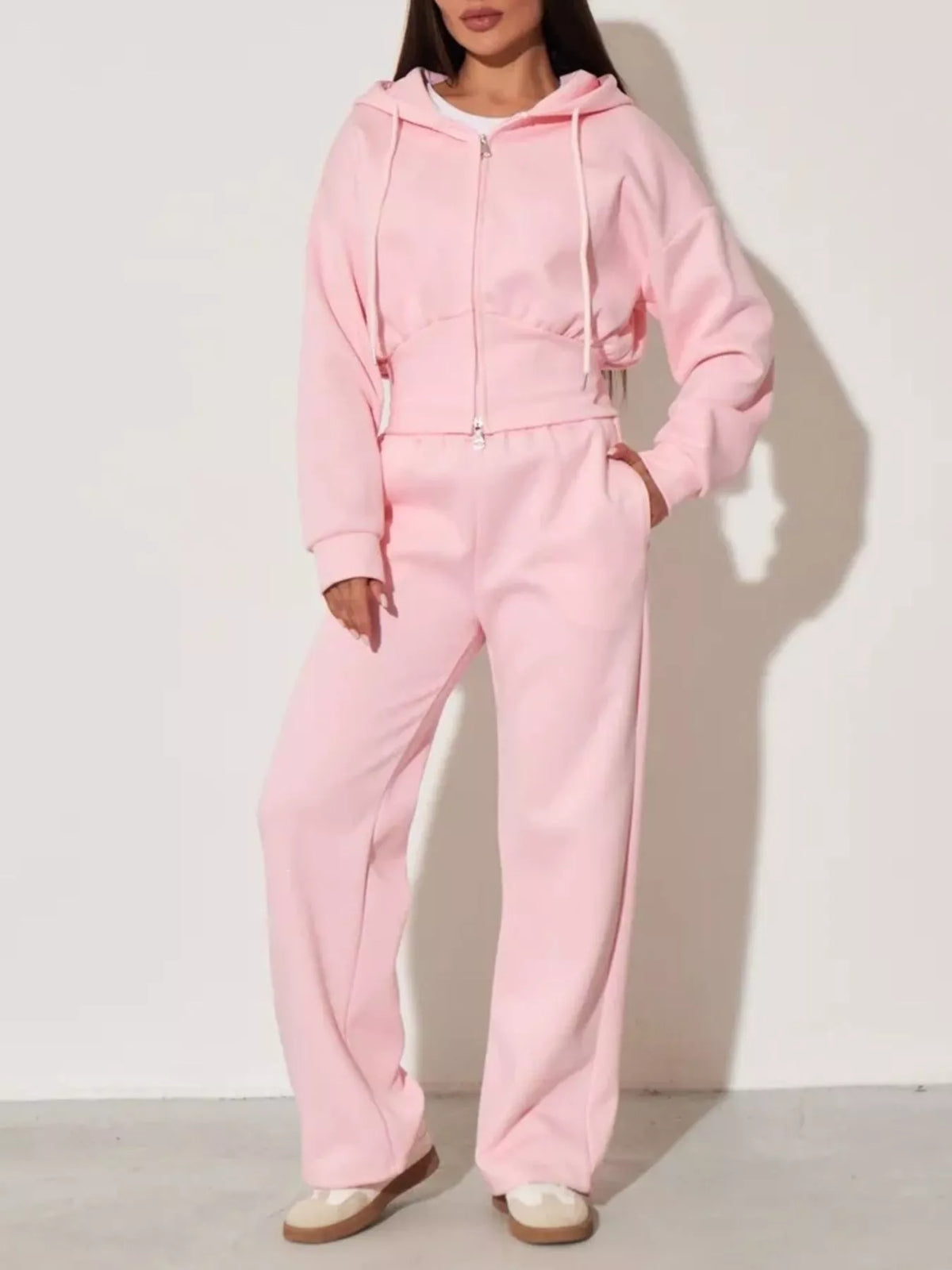 Plush Fashion Hub zip-up hoodie and wide-leg pants loungewear set on a model, showcasing comfortable casualwear ensemble.