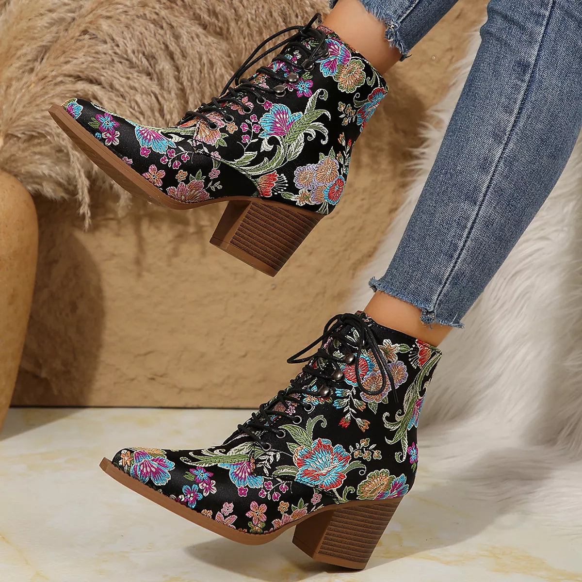 Point toe block heel boots in stylish footwear by Trendsi, featuring sleek design and sturdy block heels.
