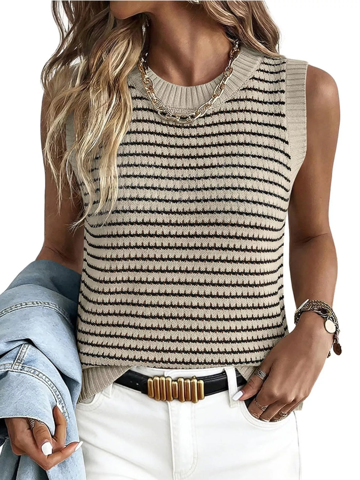 Striped knit sweater vest by Plush Fashion Hub, featuring a stylish design, soft fabric, and comfortable fit.