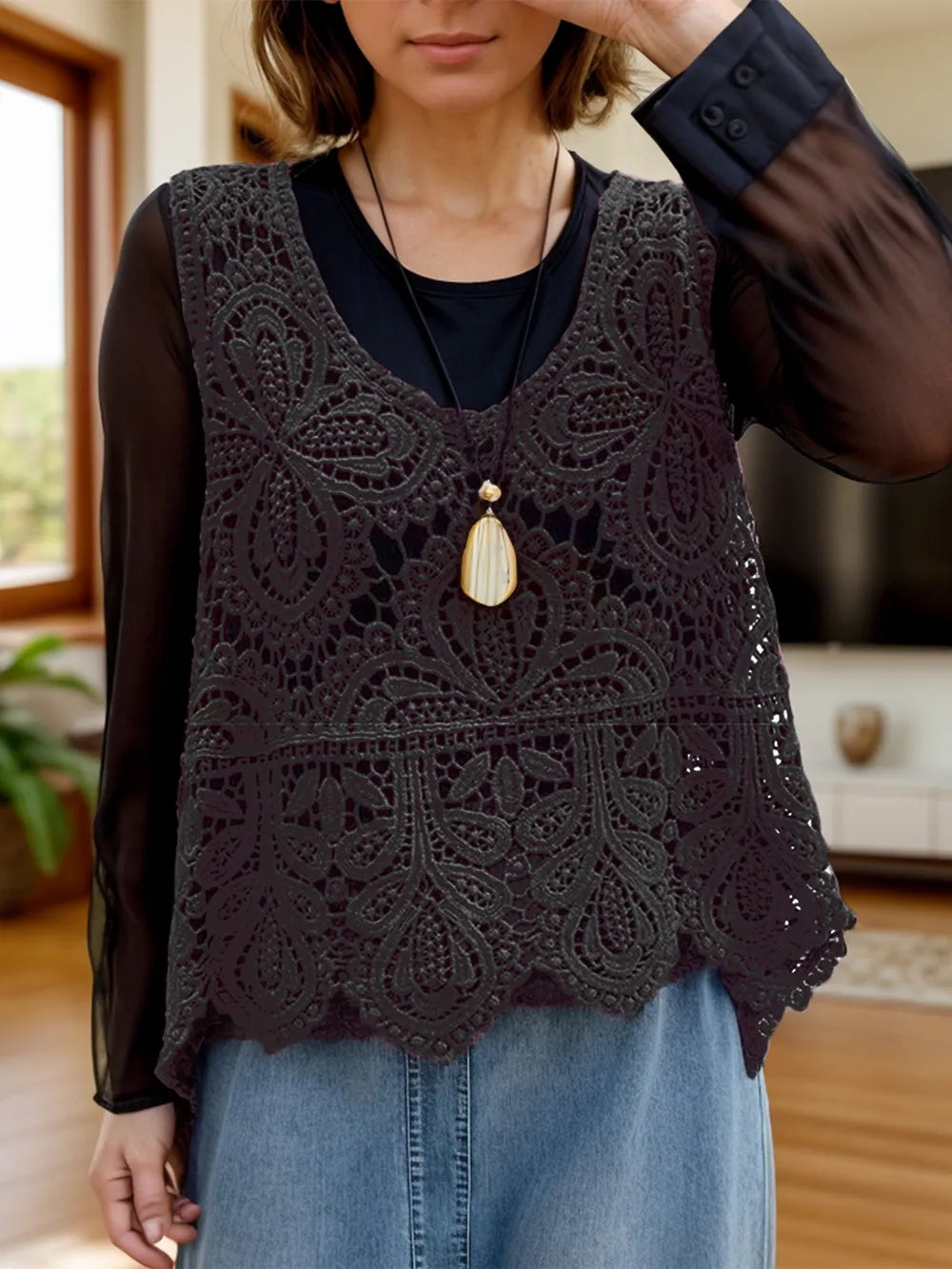 Sleeveless knit swim cover-up with a cutout scoop neck from Trendsi, featuring a lightweight, stylish design for beachwear.