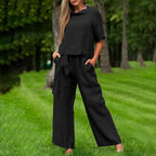 FitiqueFit casualwear set with round-neck 3/4 sleeve top and matching pants in various colors, available in sizes S to XXL.
