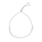 14k white gold adjustable friendship bracelet with pearls, featuring a delicate chain and clasp, showcasing elegant jewelry design.