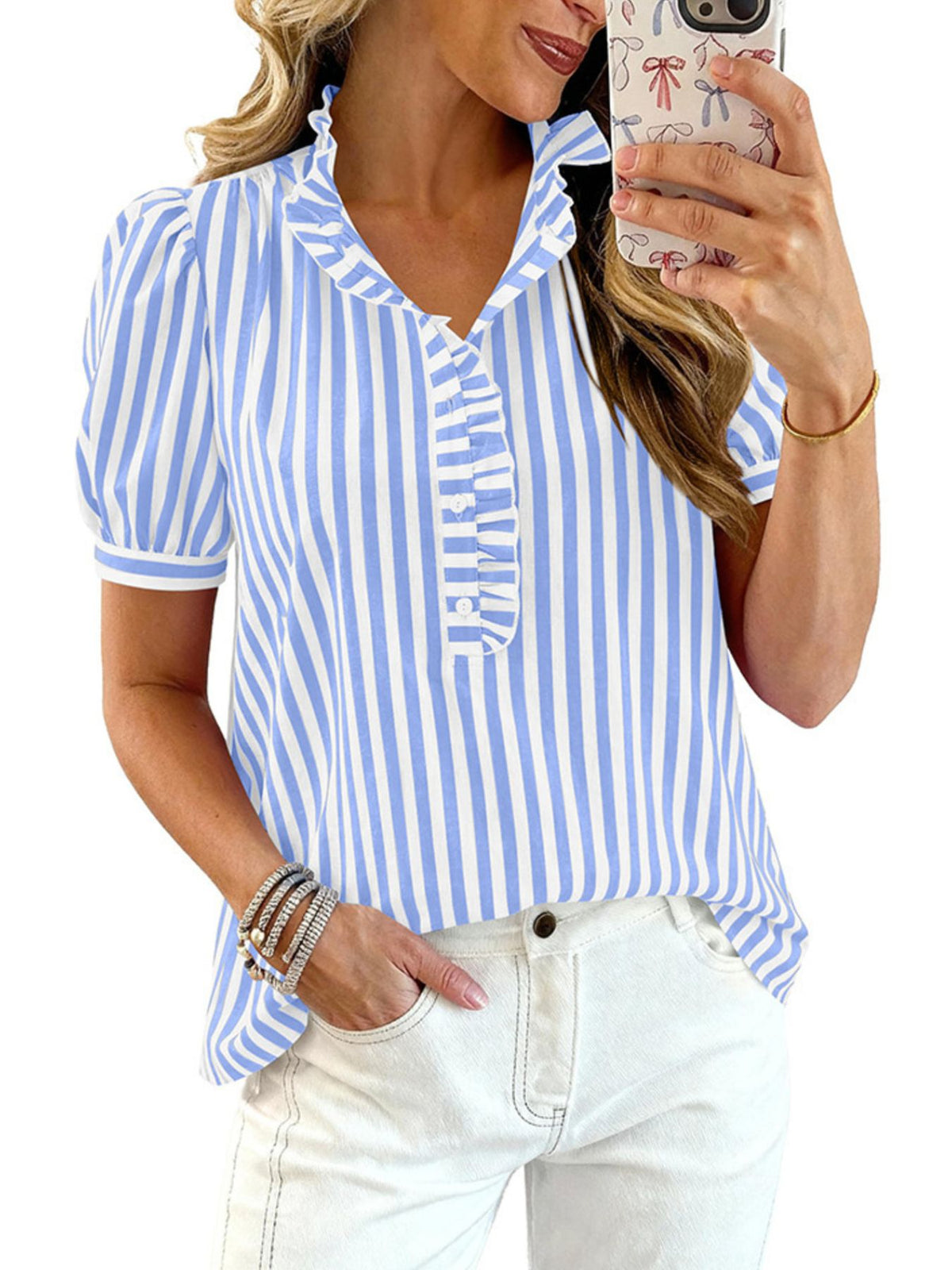 Women's striped puff sleeve blouse with ruffled details by Plush Fashion Hub, showcasing the stylish design and feminine silhouette.