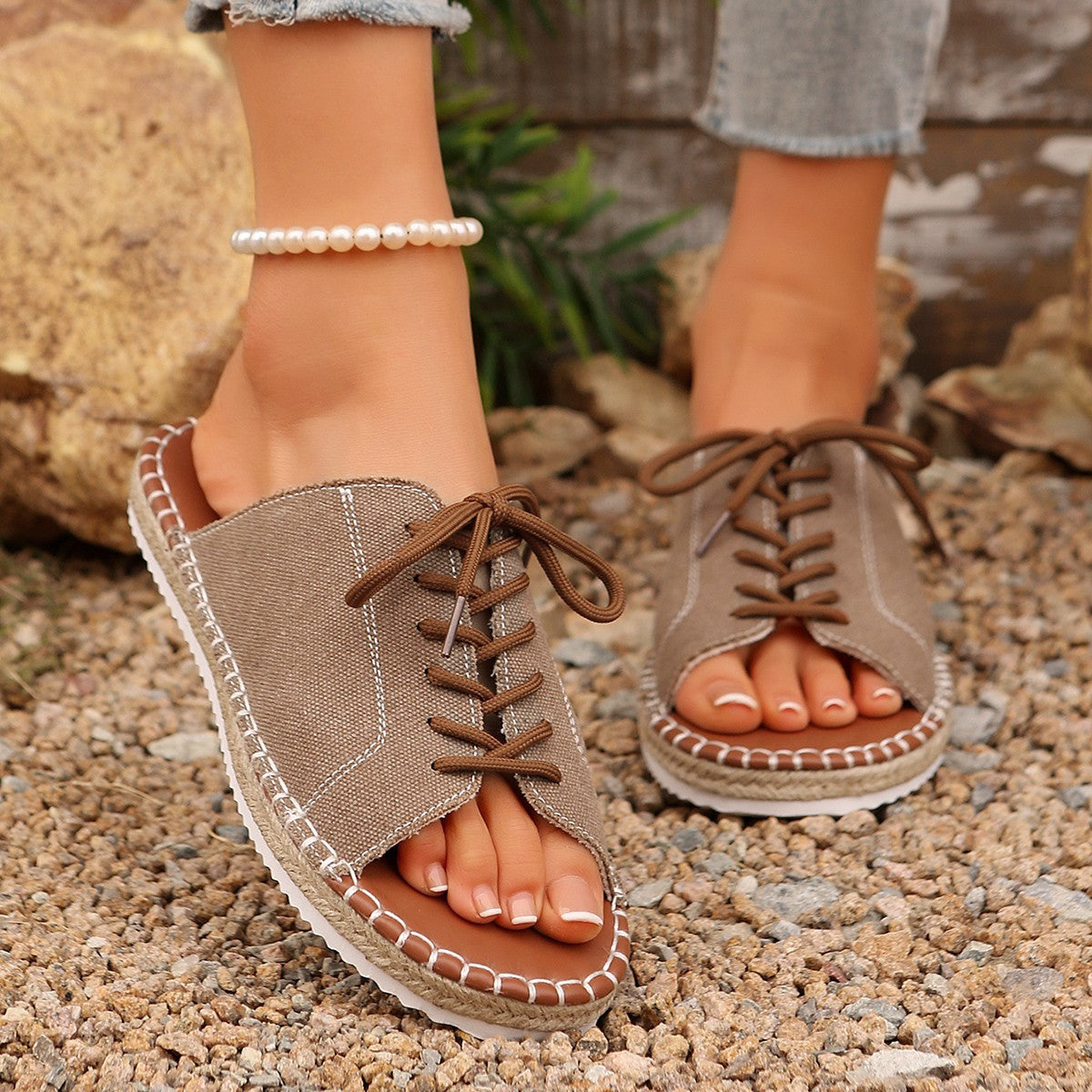 Women’s faux leather lace-up open toe flat sandals by Plush Fashion Hub, featuring a stylish design with open toes and lace-up detail.
