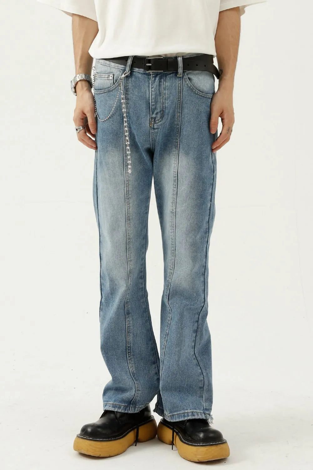 Raw hem denim jeans by Plush Fashion Hub featuring classic pockets and a relaxed fit, displayed on a neutral background.