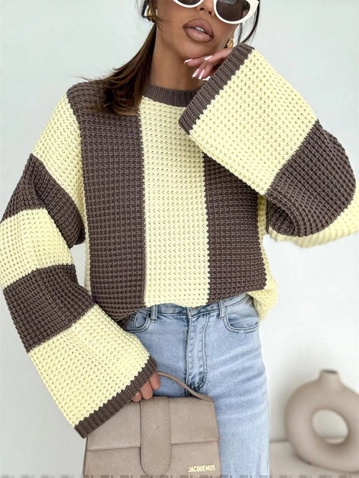 Color block long sleeve sweater by Trendsi featuring a stylish, modern design with bold color sections on soft knit fabric.