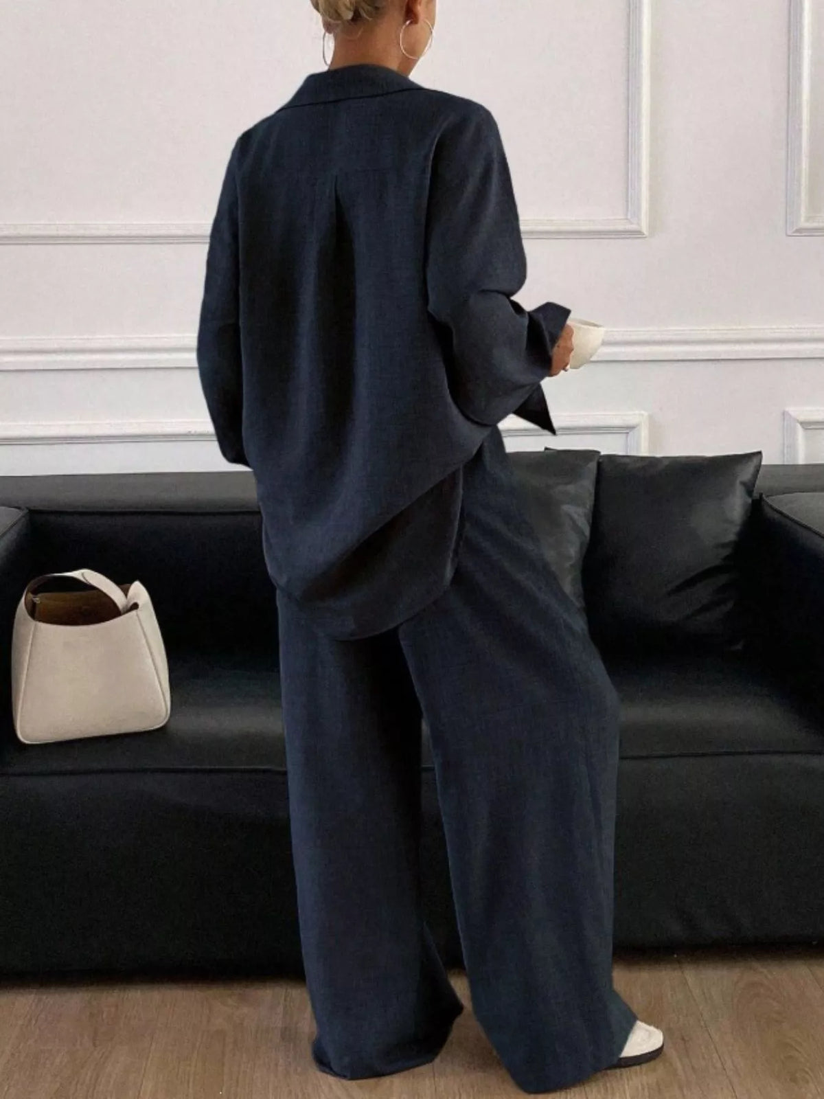 Trendsi long sleeve button-up shirt and wide-leg pants set, stylish and comfortable outfit for casual or office wear.