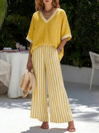 Women's striped tunic top and casual trousers two-piece set by FitiqueFit, featuring a relaxed fit and comfortable fabric.