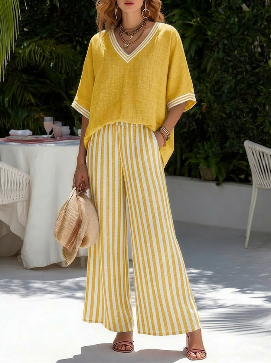 Women's striped tunic top and casual trousers two-piece set by FitiqueFit, featuring a relaxed fit and comfortable fabric.