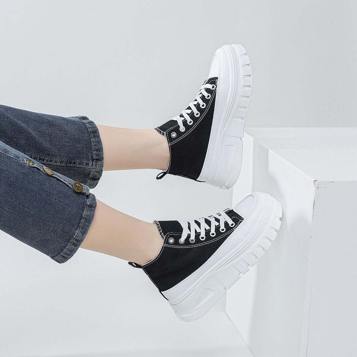 Women Lace-Up Front High Top Platform Canvas ShoesThese women's canvas shoes feature a stylish lace-up front and a high top platform design. With a flat heel, they offer both comfort and height. The height increasinShoePlush Fashion ShopPlush Fashion Shop