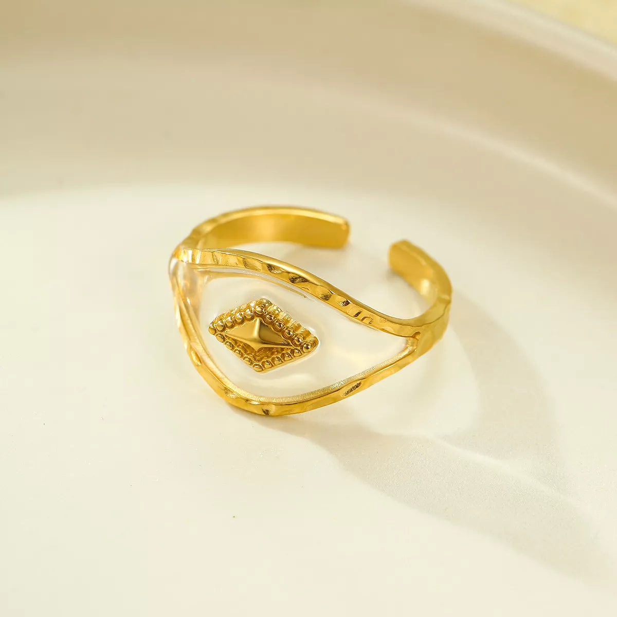 Gold-plated adjustable open ring from Plush Fashion Hub, showcasing a sleek and modern design on a white background.