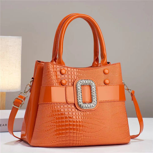 Lizard pattern mini bucket crossbody bag with zipper from eprolo, featuring a compact design and adjustable strap.