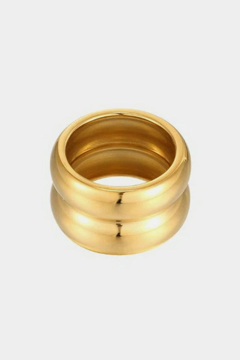 Gold double ridge ring from Plush Fashion Hub featuring a sleek band with dual ridges for a stylish look.