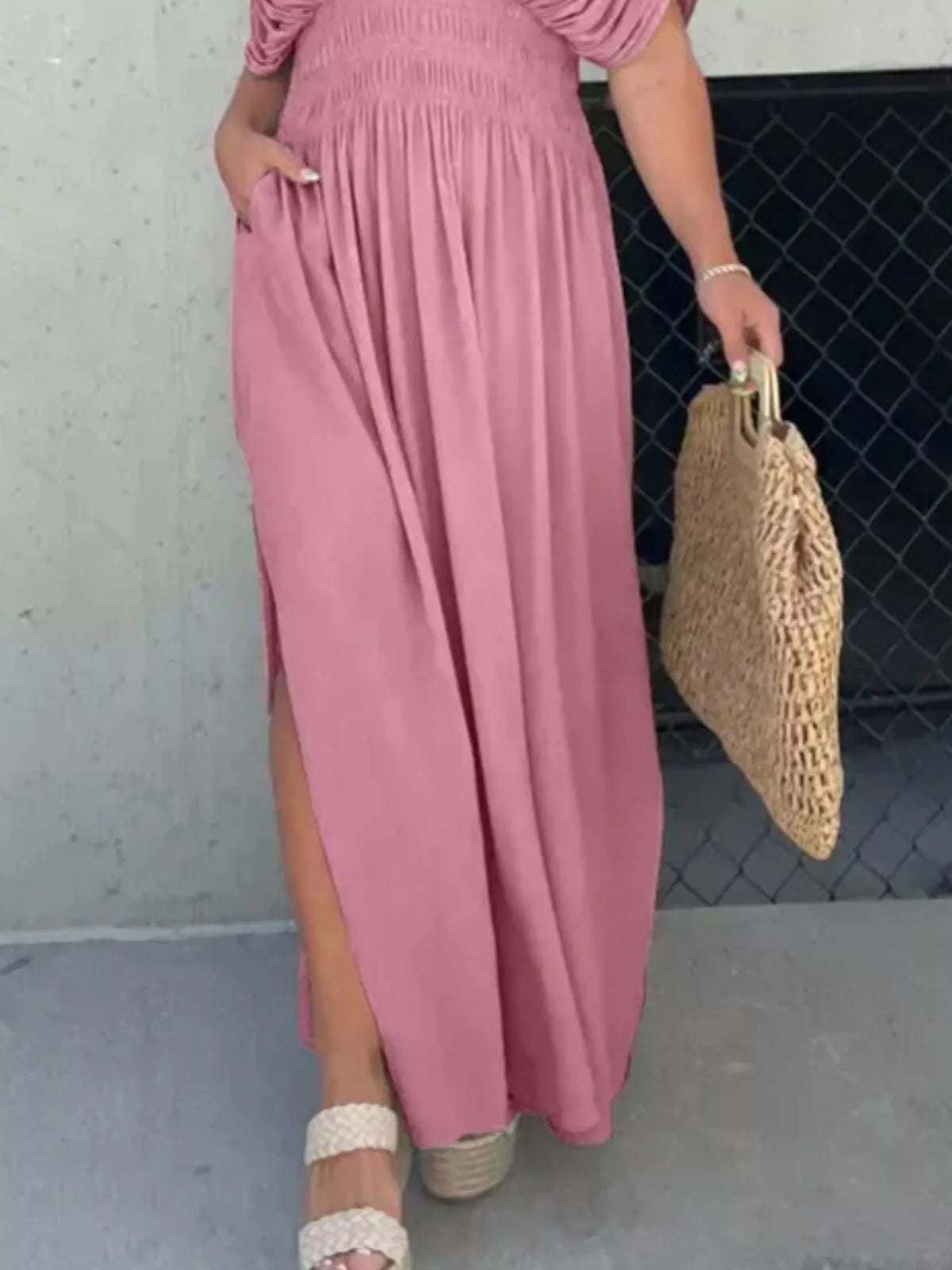 Plus size full slit V-neck maxi dress with smocked waist by Plush Fashion Hub, showing the flowing fabric and stylish neckline.