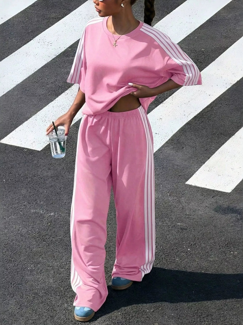 Trendsi striped short sleeve top and matching pants set, casual and stylish, featuring a colorful striped pattern and comfortable fit.
