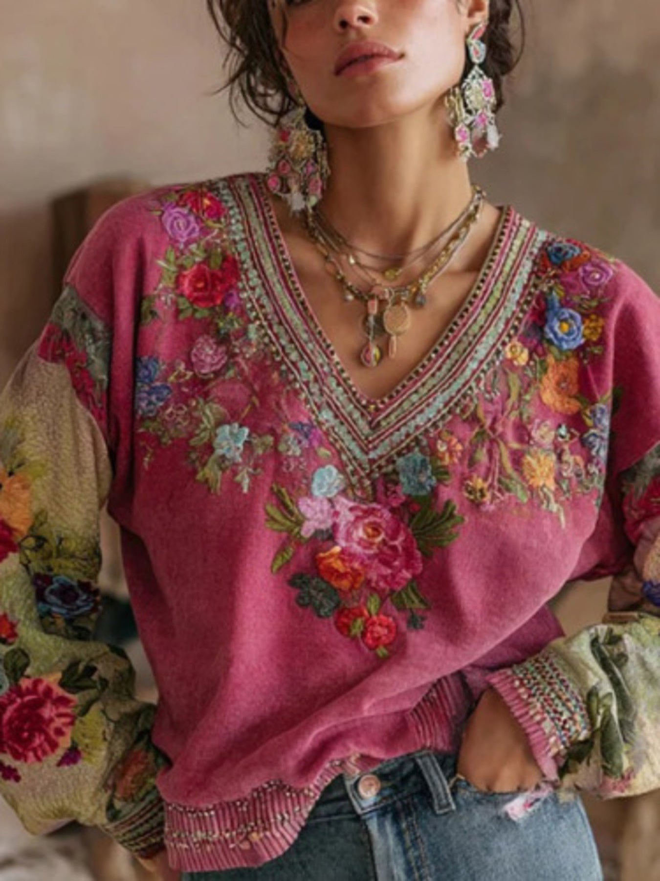 Plus size floral embroidered V-neck blouse by Trendsi featuring delicate embroidery and elegant design on lightweight fabric
