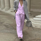 Women’s V-neck button-front vest and high-waist pants set from FitiqueFit, styled together for casualwear, with a relaxed fit and soft fabric.