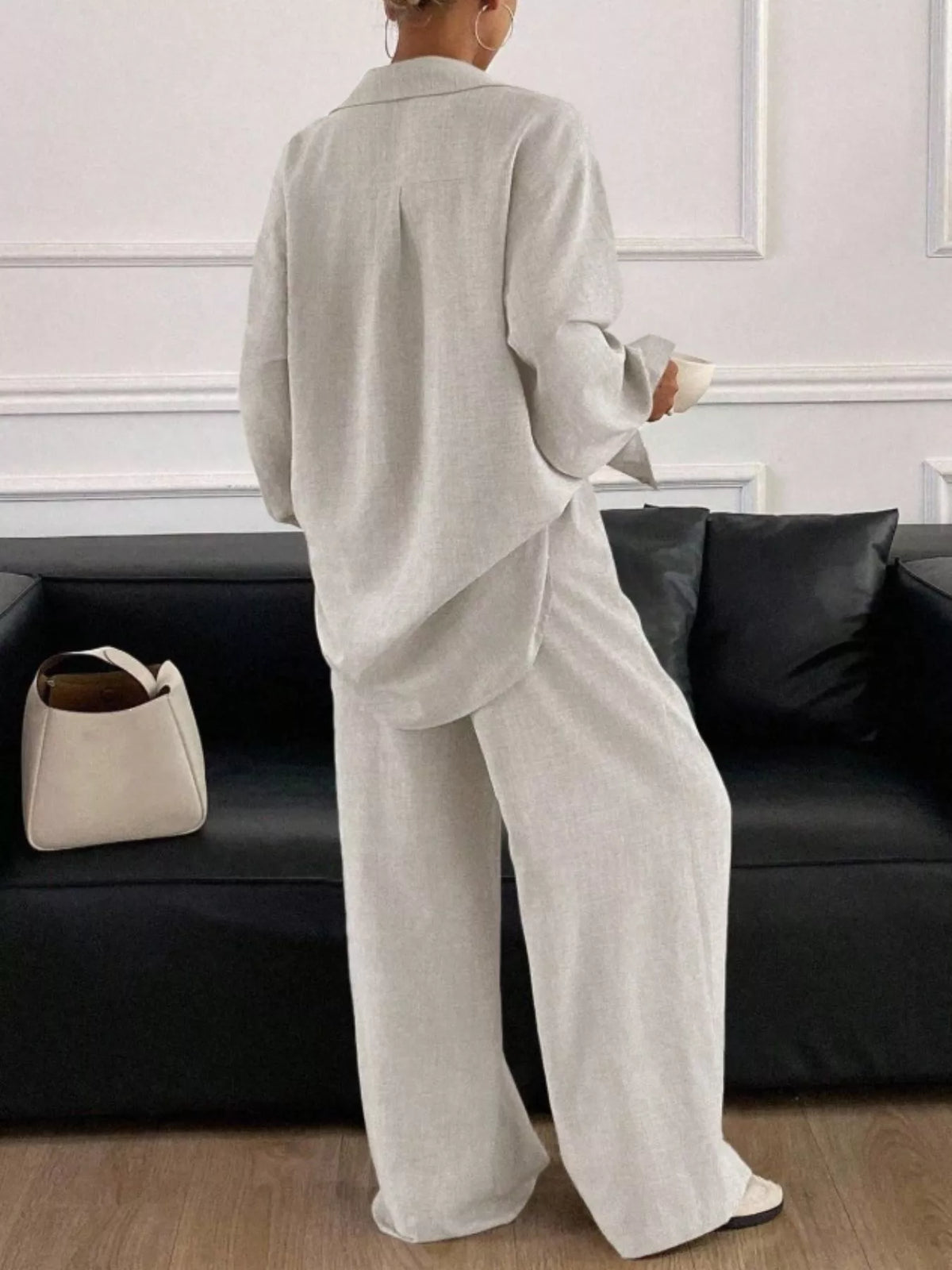 Trendsi long sleeve button-up shirt and wide-leg pants set, stylish and casual outfit, shown on a model.