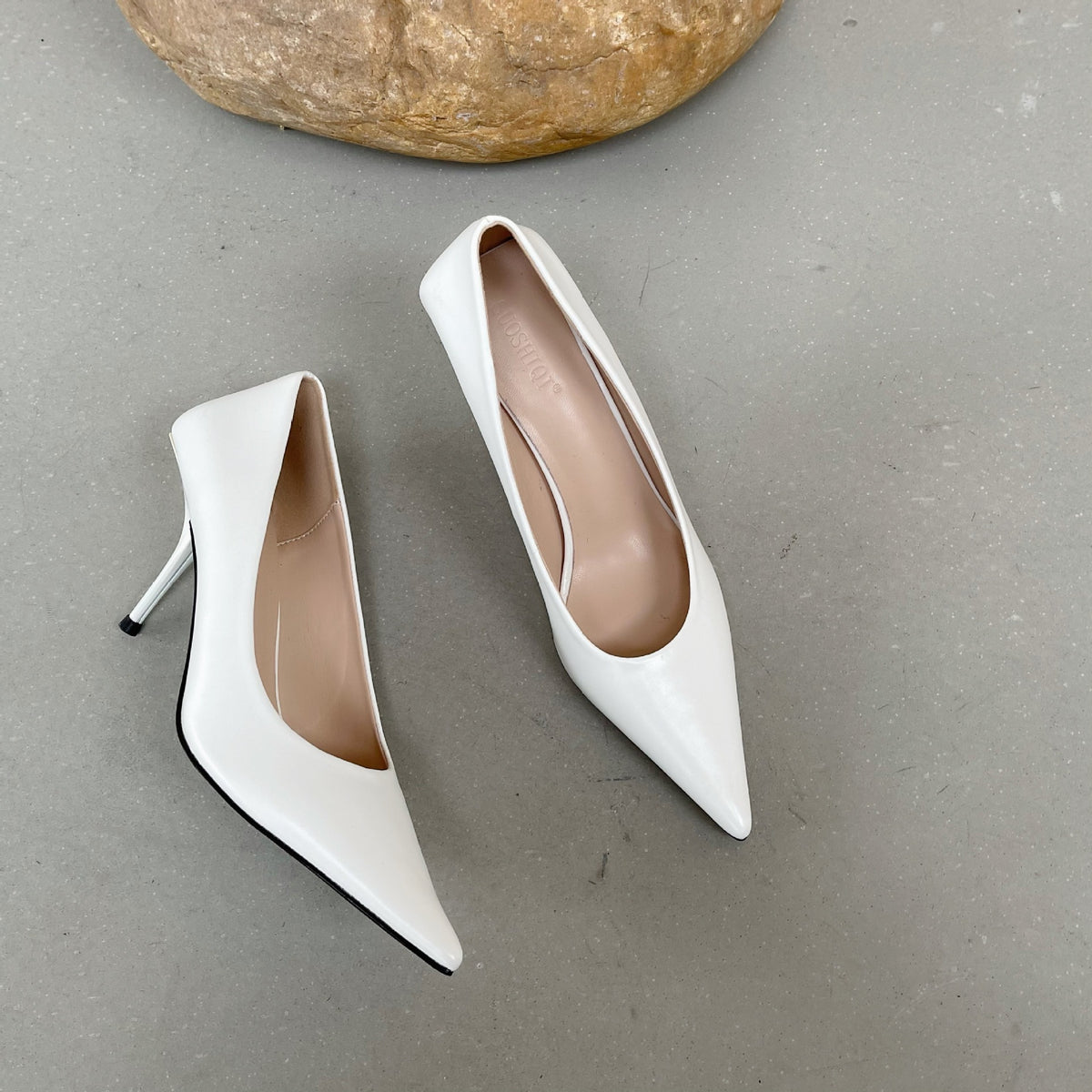 Women's plush leather pointed-toe stiletto pumps by Plush Fashion Hub, showcasing elegant black high heels with sleek design.