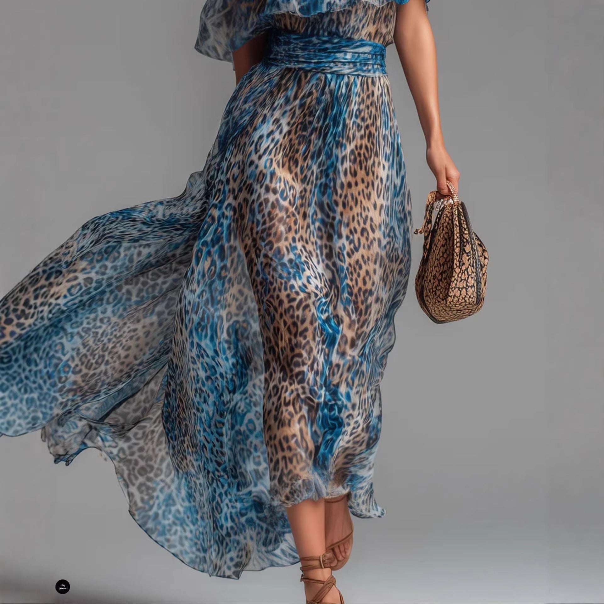 Peacock blue leopard print chiffon off-shoulder boho A-line dress, casualwear style with flowing fabric and relaxed fit.
