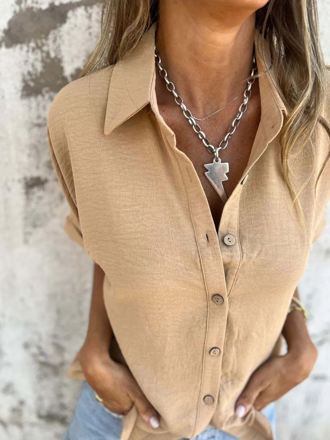 Women's collared button-down blouse from Plush Fashion Hub featuring half sleeves and a professional office style.