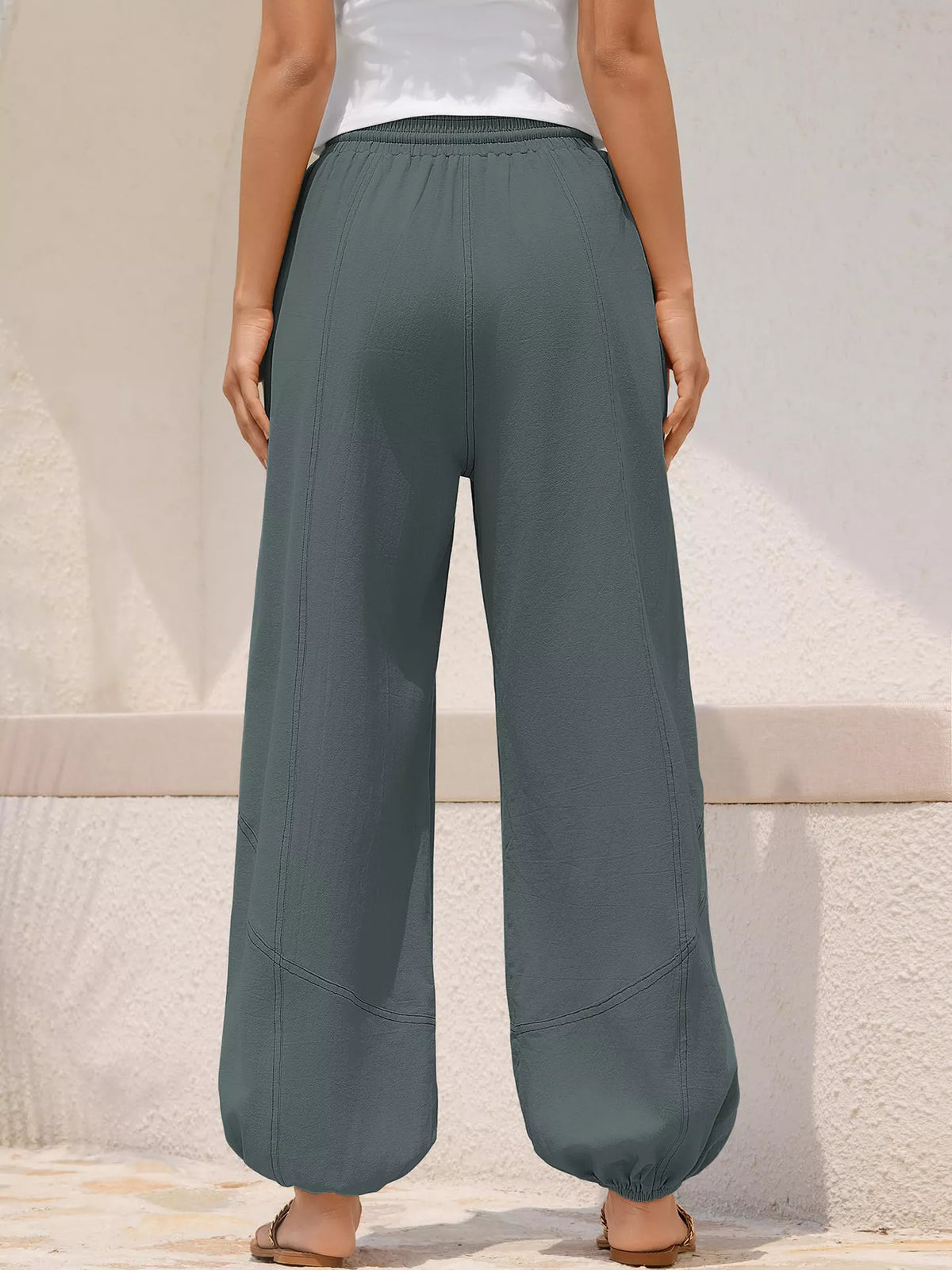 Plush Fashion Hub casual loose fit harem joggers with drawstring waist, relaxed style, and soft fabric, shown on a model.