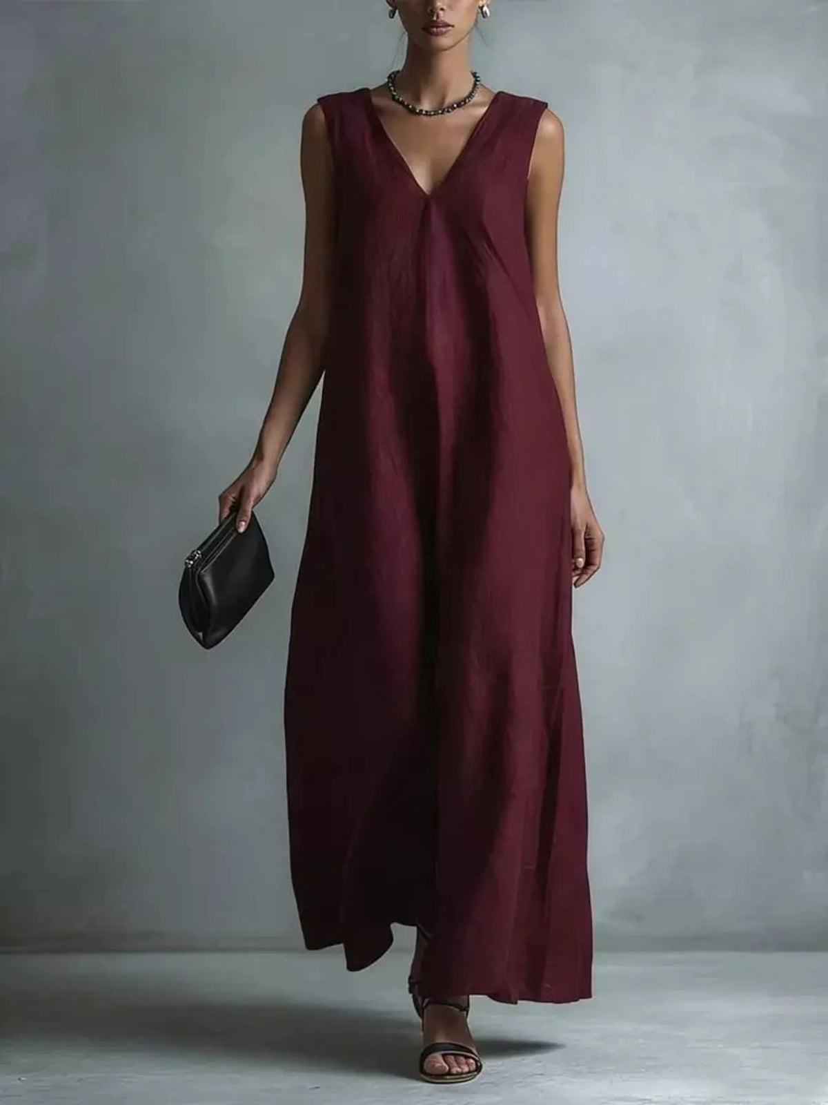 Plus size full V-neck sleeveless maxi dress by Plush Fashion Hub, flowing fabric and elegant design for plus size women.