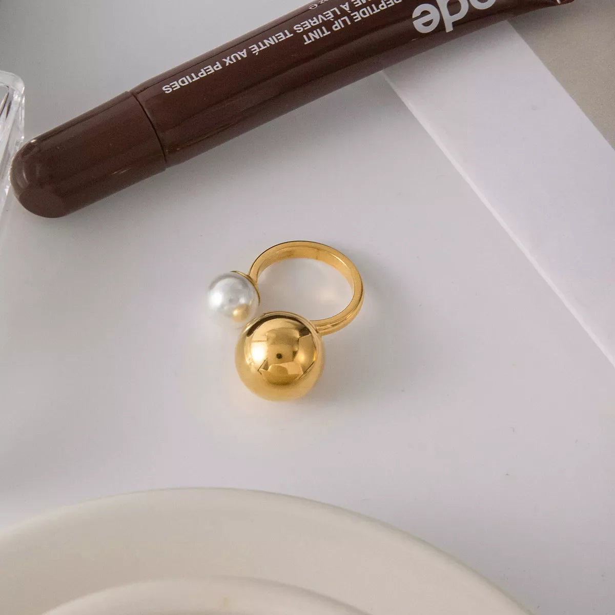 18K gold-plated open ring with a pearl and orb accent, stylish jewelry piece from Plush Fashion Hub.
