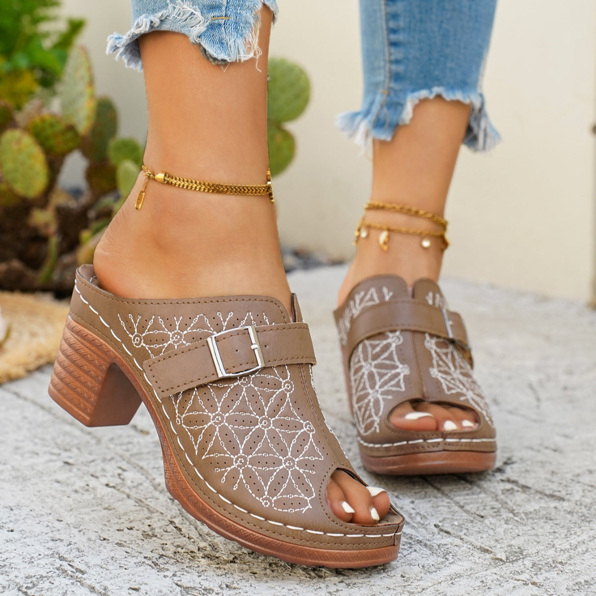 Women's chic buckle detail block heel sandals in premium faux leather with stylish straps and comfortable heel.