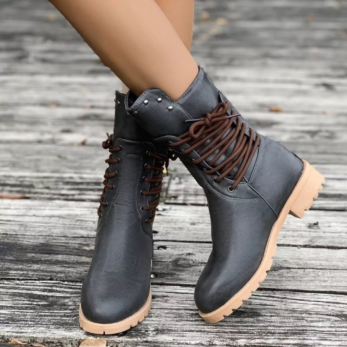Lace-up block heel boots in black leather from Trendsi, featuring chunky heels and stylish design for versatile footwear.