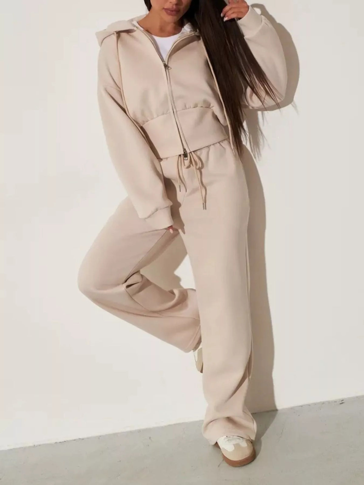 Plush Fashion Hub zip-up hoodie and wide-leg pants loungewear set, soft fabric, casual style, displayed on a hanger.