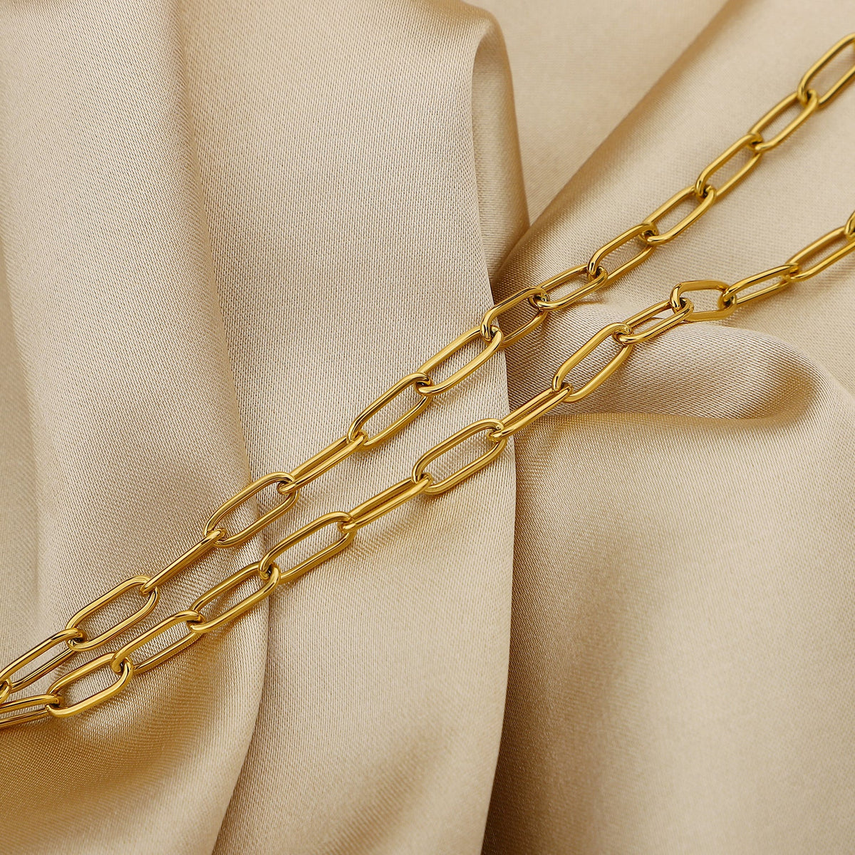 Stainless steel chain necklace with a sleek, modern design from Plush Fashion Hub, displayed on a neutral background.
