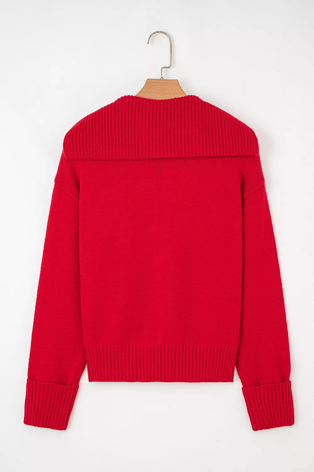 Women's ribbed hem long sleeve sweater from Trendsi, showing a cozy, fitted knit sweater with ribbed hem and long sleeves.