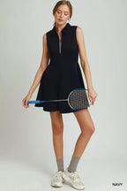 Umgee collared quarter zip tennis dress by Trendsi, stylish dress with collar and zip detail, suitable for sports or casual wear.