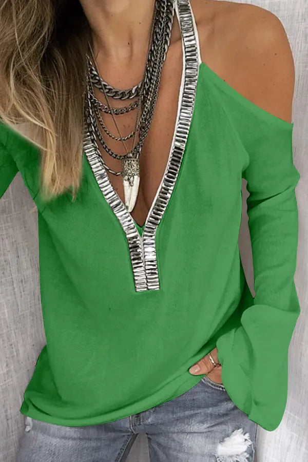 Plush Fashion Hub sequin V-neck cold shoulder top featuring shiny sequins and stylish cold shoulder design.