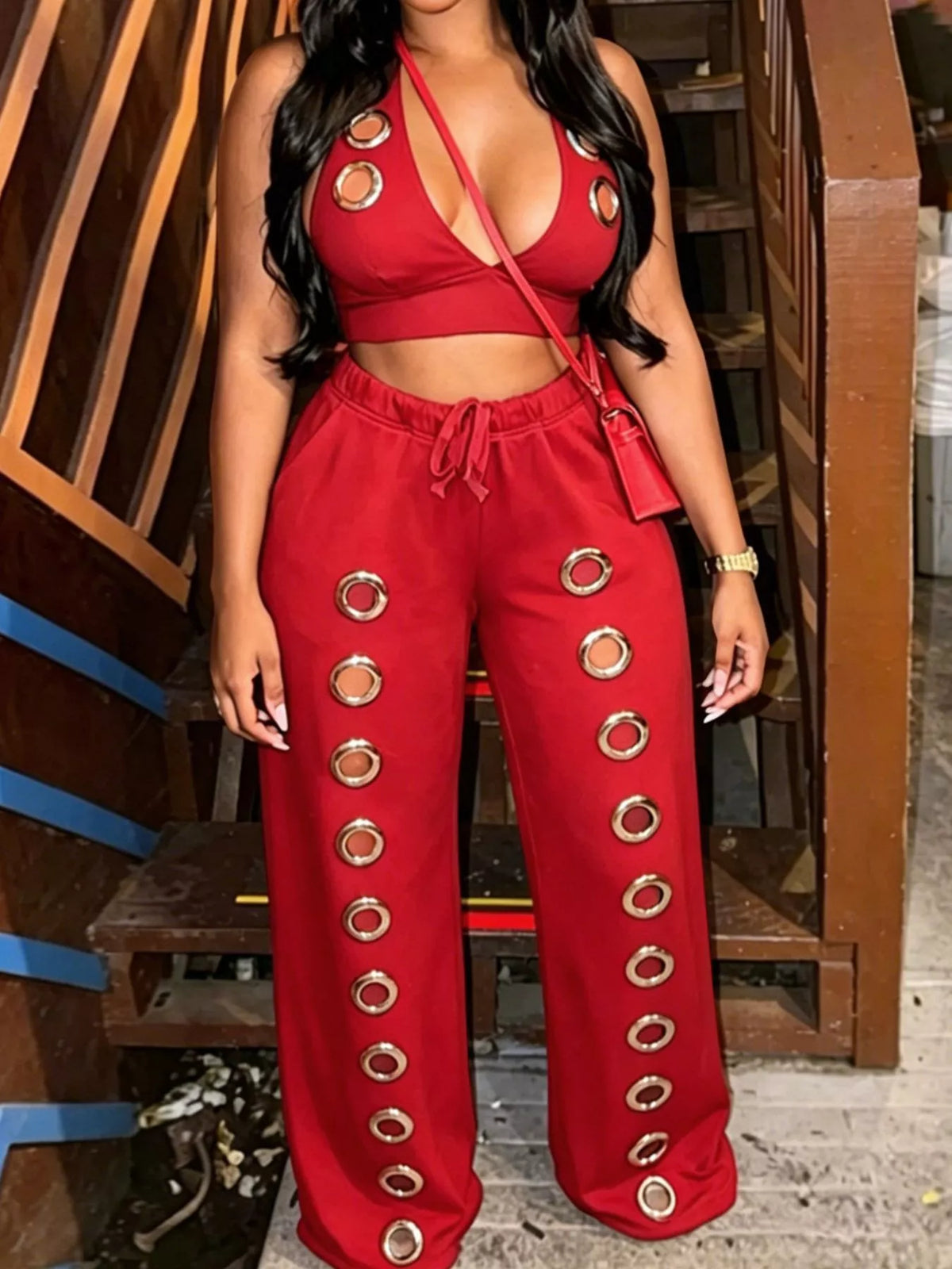 Trendsi eyelet crop top and wide-leg pants set featuring a stylish crop top with eyelet details and flowing wide-leg trousers.