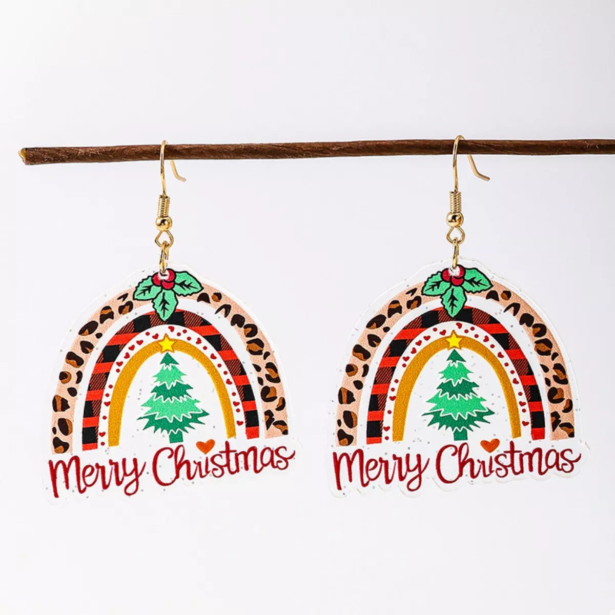Colorful rainbow dangle earrings from Plush Fashion Hub featuring festive Christmas-themed jewelry for holiday style.