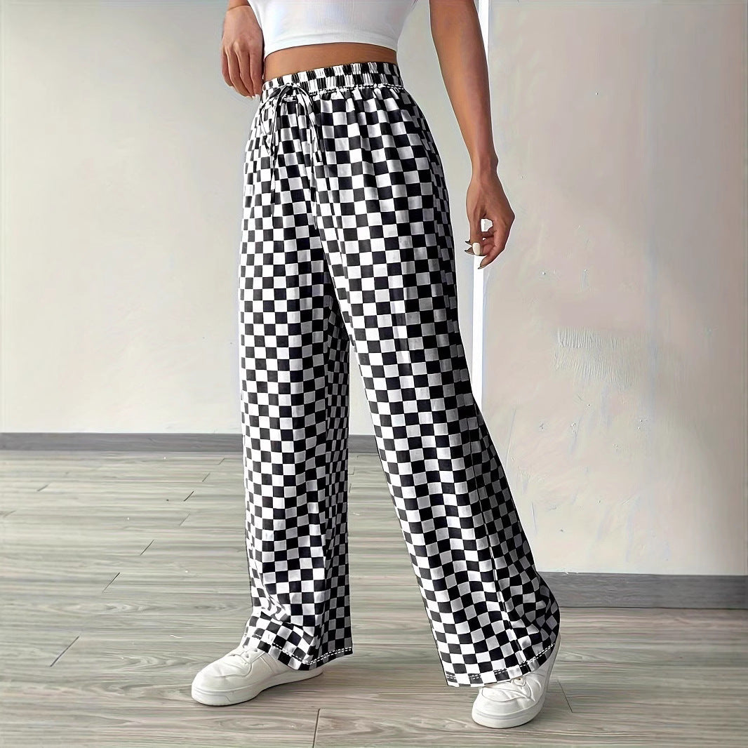 Checkerboard high-waisted wide-leg pants from Plush Fashion Hub in four colors, featuring a bold checkerboard pattern and relaxed fit.