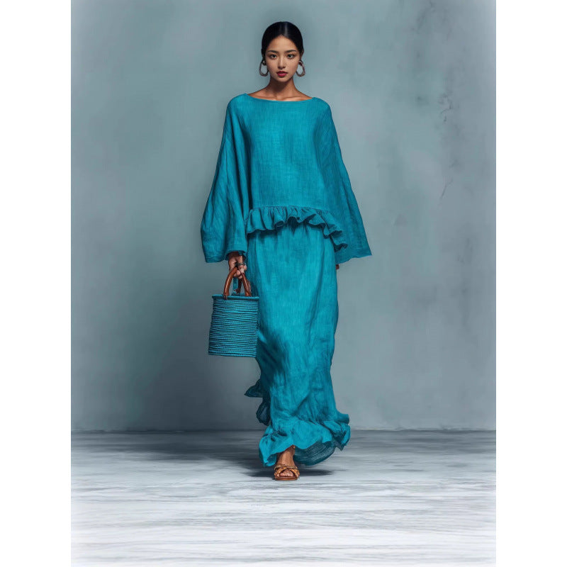 Modern solid long sleeve top and irregular skirt set from Plush Fashion Hub, stylish women's fashion ensemble.